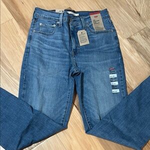 Levi's Blue Straight Leg Jeans with Distressed Details. New with tags.